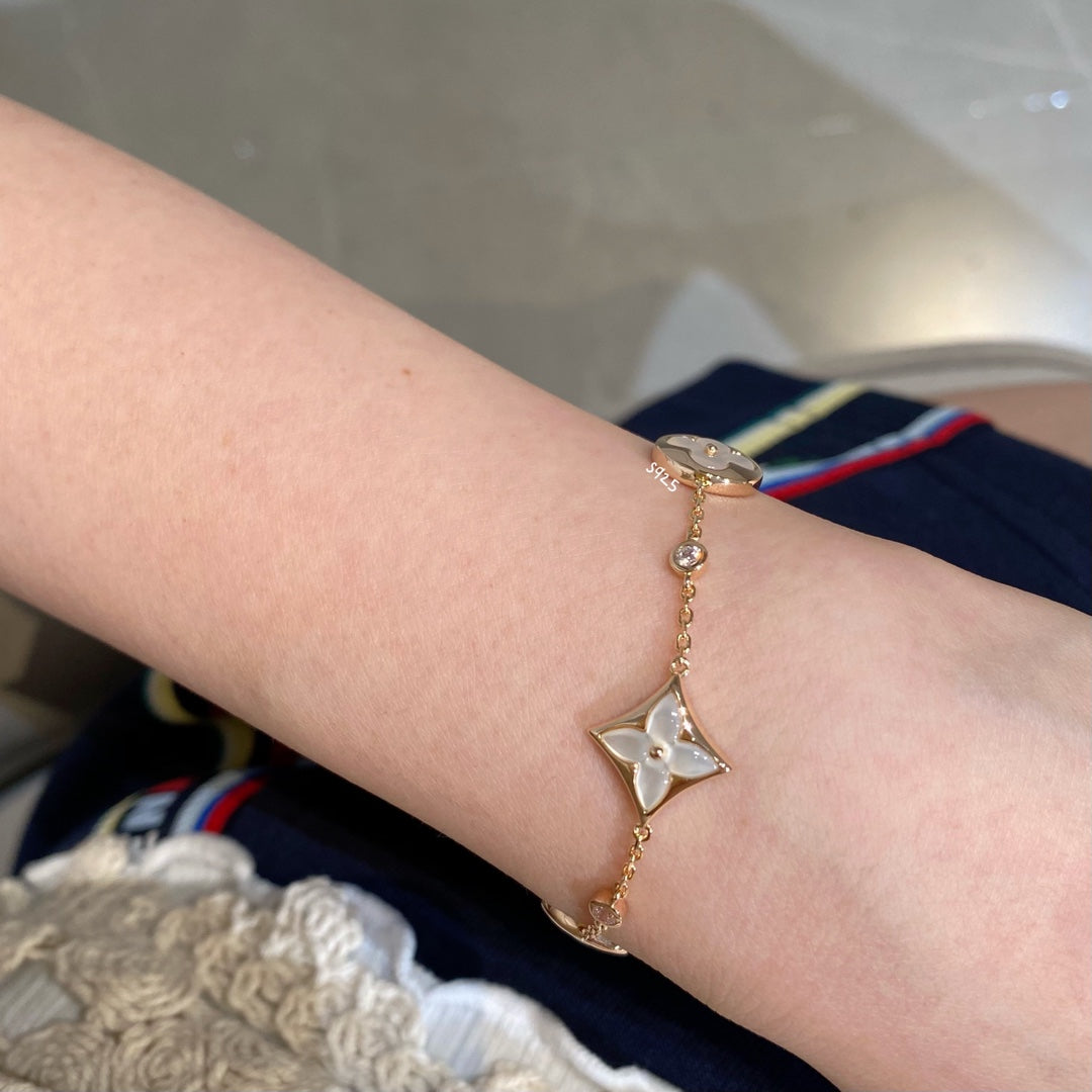 [⭐Seralia]STAR AND SUN 4 MOTIF WHITE MOP PINK GOLD BRACELET